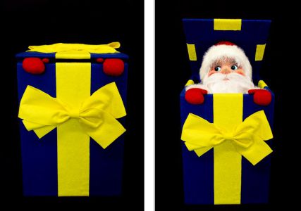 Weihnachtsmann im Geschenkpaket